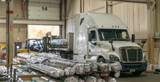 Merit Brass Warehouse on Wheels flatbed delivery support for pipe and long products